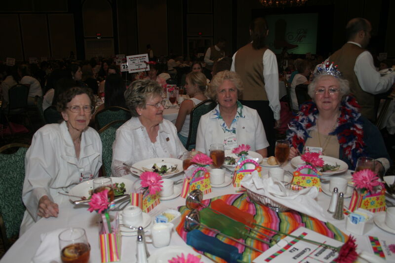 Phillips, Unidentified, Jackson, and Nemir at Convention Sisterhood Luncheon Photograph 1, July 15, 2006 (Image)