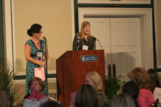 Unidentified Phi Mu and Mary Helen Griffis Speaking at Convention Luncheon Photograph, July 2006 (image)