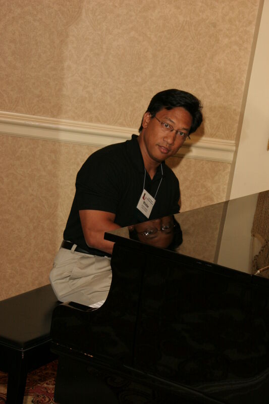 Victor Carreon Playing Piano at Convention Photograph 9, July 13, 2006 (Image)
