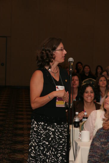 Gayle Price at Microphone During Thursday Convention Session Photograph 1, July 13, 2006 (image)