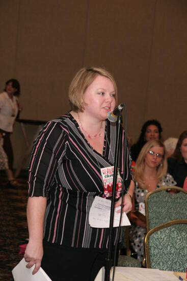 Cara Dawn Byford at Microphone During Thursday Convention Session Photograph 1, July 13, 2006 (image)