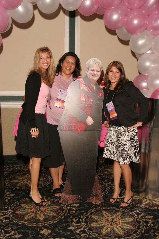 July 13 Three Phi Mus With Cardboard Image of Kathy Williams at Thursday Convention Luncheon Photograph Image