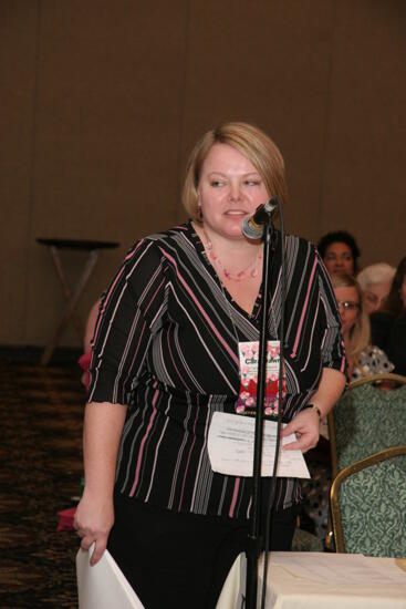 Cara Dawn Byford at Microphone During Thursday Convention Session Photograph 2, July 13, 2006 (image)