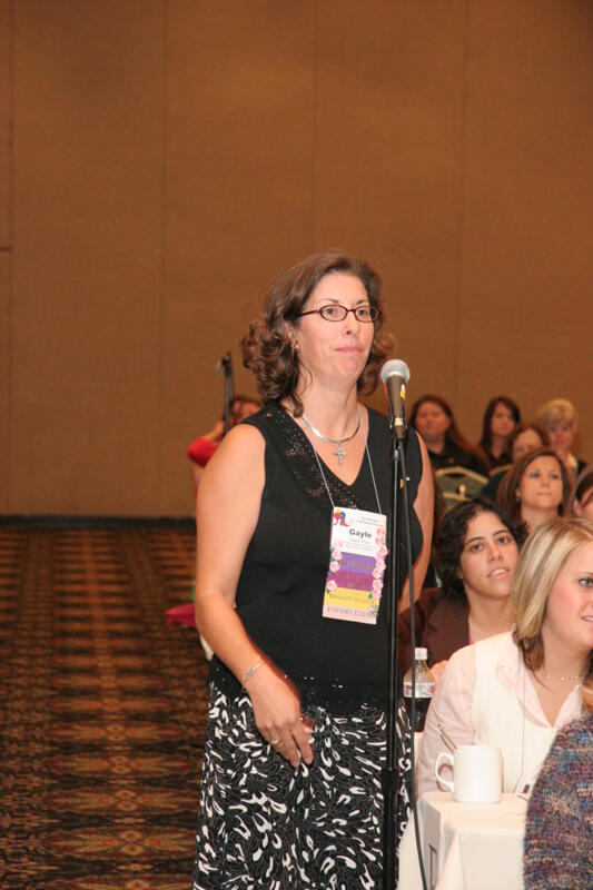 July 13 Gayle Price at Microphone During Thursday Convention Session Photograph 2 Image