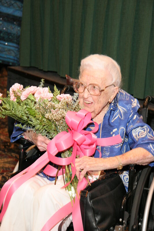 Leona Hughes With Flowers at Thursday Convention Session Photograph, July 13, 2006 (Image)