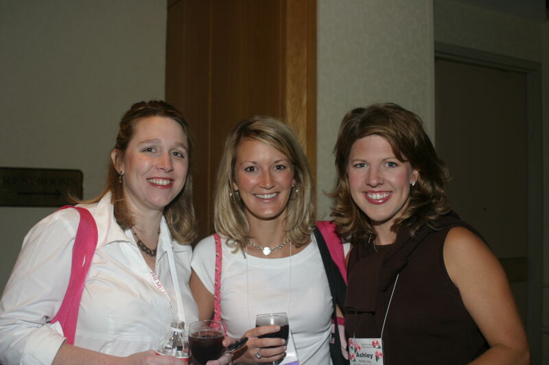 Ashley Day and Two Unidentified Phi Mus at Convention Photograph, July 8, 2004 (Image)