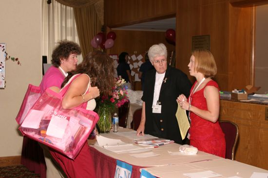 Phi Mus at Convention Registration Desk Photograph 1, July 8, 2004 (image)