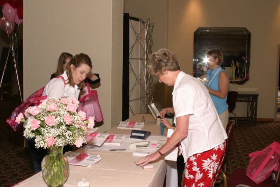 Phi Mus at Convention Registration Desk Photograph 2, July 8, 2004 (image)