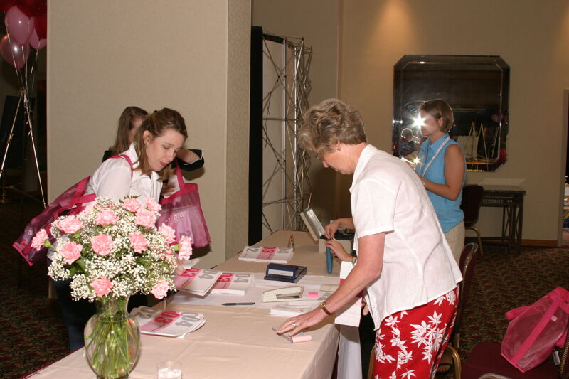 July 8 Phi Mus at Convention Registration Desk Photograph 2 Image