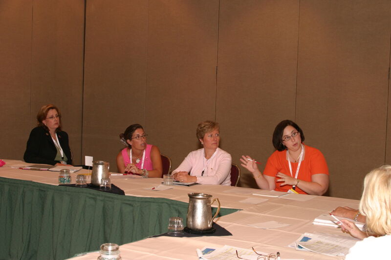 Four Phi Mus in a Meeting at Convention Photograph, July 8, 2004 (Image)