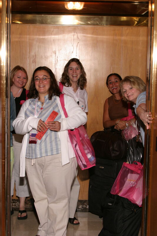 Five Phi Mus in Elevator at Convention Photograph, July 8, 2004 (Image)