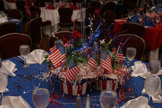 Convention Red, White, and Phi Mu Dinner Centerpiece Photograph, July 8, 2004 (image)