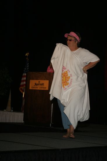 Kathy Williams With Beach Towel in Convention Fashion Show Photograph 1, July 8, 2004 (image)