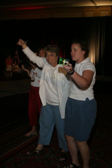 Phi Mus With Cameras at Convention Photograph, July 8, 2004 (image)