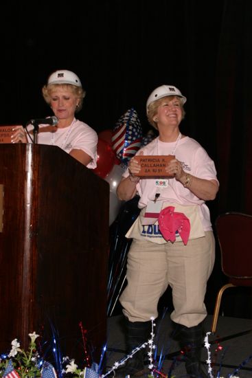 Kathie Garland and Unidentified With Bricks at Convention Photograph 1, July 8, 2004 (image)