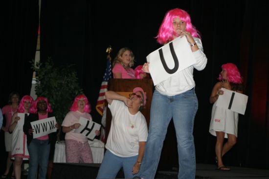 Phi Mus Holding Letters in Convention Fashion Show Photograph 1, July 8, 2004 (image)