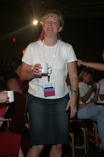 Molly Williams Carrying Cup of Coffee at Convention Photograph, July 8, 2004 (image)