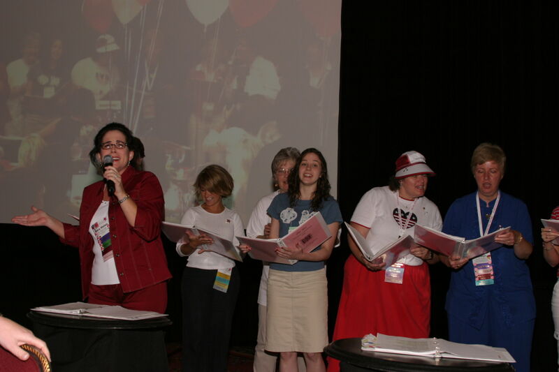 Convention Choir Singing at Red, White, and Phi Mu Dinner Photograph 2, July 8, 2004 (Image)