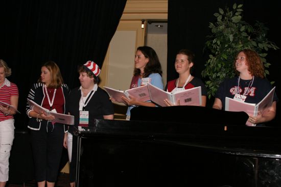 Convention Choir Singing at Red, White, and Phi Mu Dinner Photograph 1, July 8, 2004 (image)