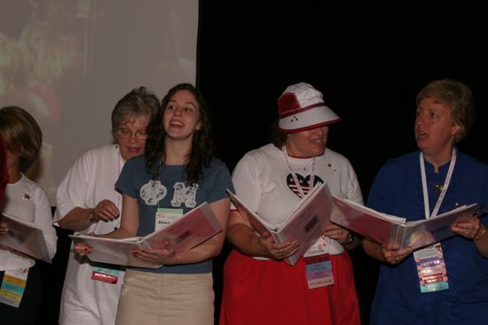 Convention Choir Singing at Red, White, and Phi Mu Dinner Photograph 3, July 8, 2004 (image)