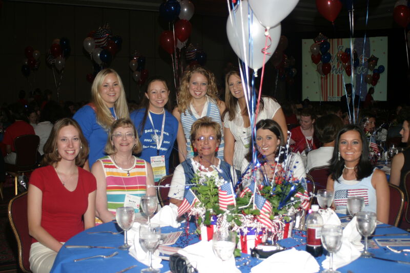 Table of Nine at Convention Red, White, and Phi Mu Dinner Photograph 6, July 8, 2004 (Image)