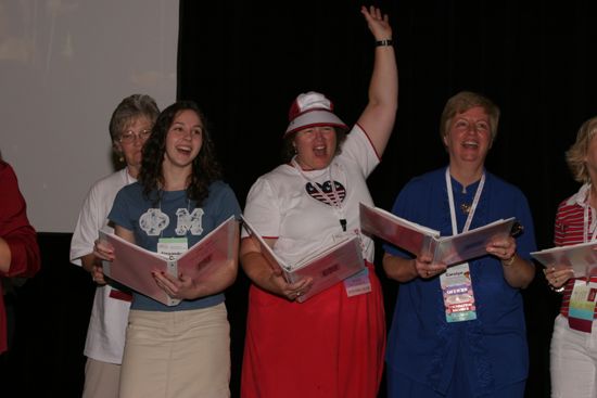 Convention Choir Singing at Red, White, and Phi Mu Dinner Photograph 4, July 8, 2004 (image)