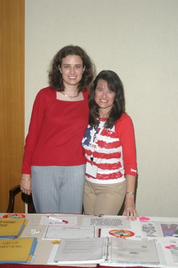 Two Phi Mus at Convention Resource Table Photograph, July 8, 2004 (image)