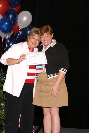 Kathy Williams and Philadelphia Suburban Alumnae Chapter Member With Certificate at Convention Photograph, July 8, 2004 (image)