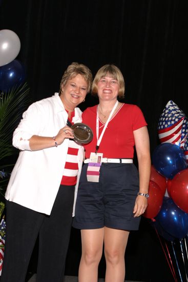 Kathy Williams and Unidentified With Award at Convention Photograph 5, July 8, 2004 (image)