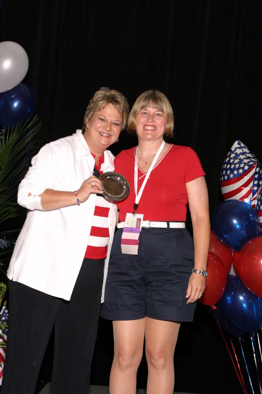 July 8 Kathy Williams and Unidentified With Award at Convention Photograph 5 Image