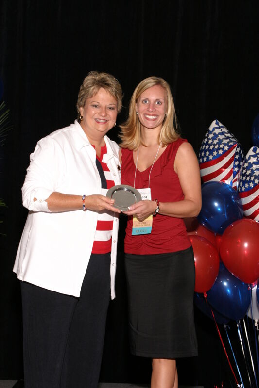 Kathy Williams and Unidentified With Award at Convention Photograph 7, July 8, 2004 (Image)