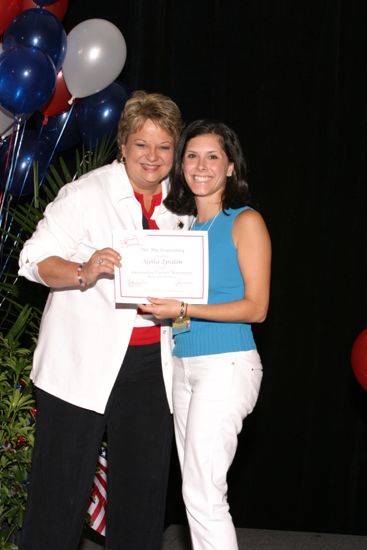 Kathy Williams and Alpha Epsilon Chapter Member With Certificate at Convention Photograph, July 8, 2004 (image)