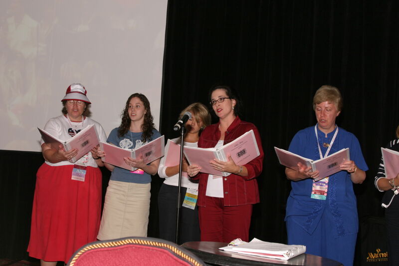 Convention Choir Singing at Red, White, and Phi Mu Dinner Photograph 5, July 8, 2004 (Image)