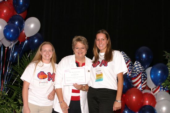 Williams, Bauer, and Foerster With Certificate at Convention Photograph, July 8, 2004 (image)