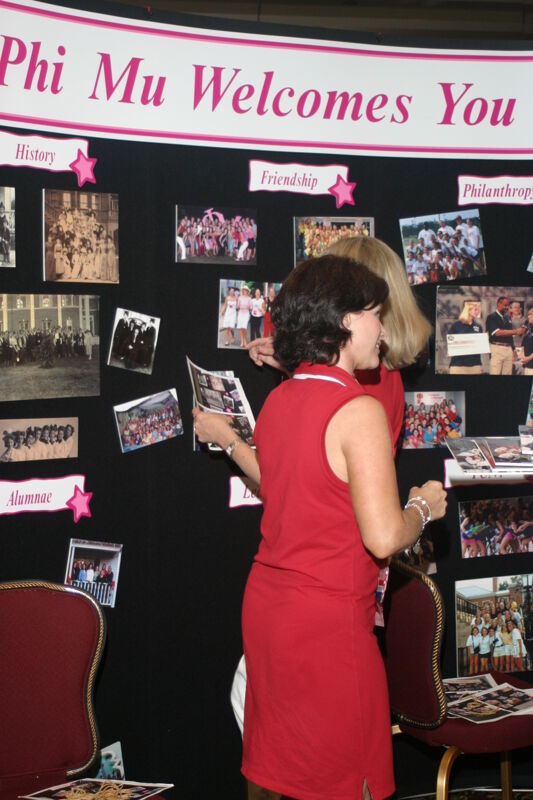 Phi Mus Setting Up Convention Exhibit Photograph, July 8, 2004 (Image)