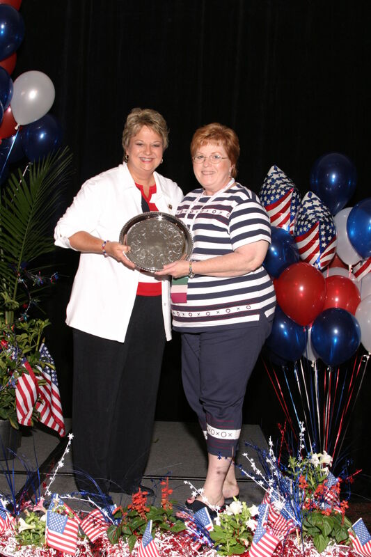Kathy Williams and Unidentified With Award at Convention Photograph 3, July 8, 2004 (Image)