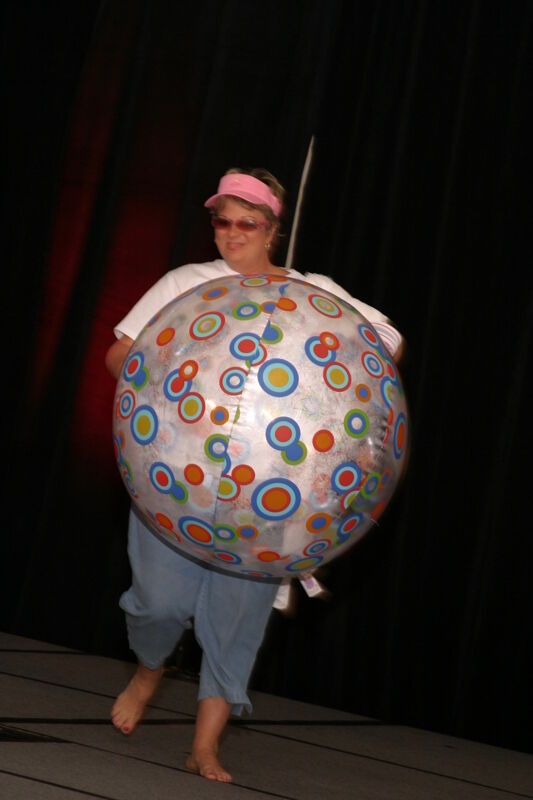 Kathy Williams With Beach Ball in Convention Fashion Show Photograph 2, July 8, 2004 (Image)