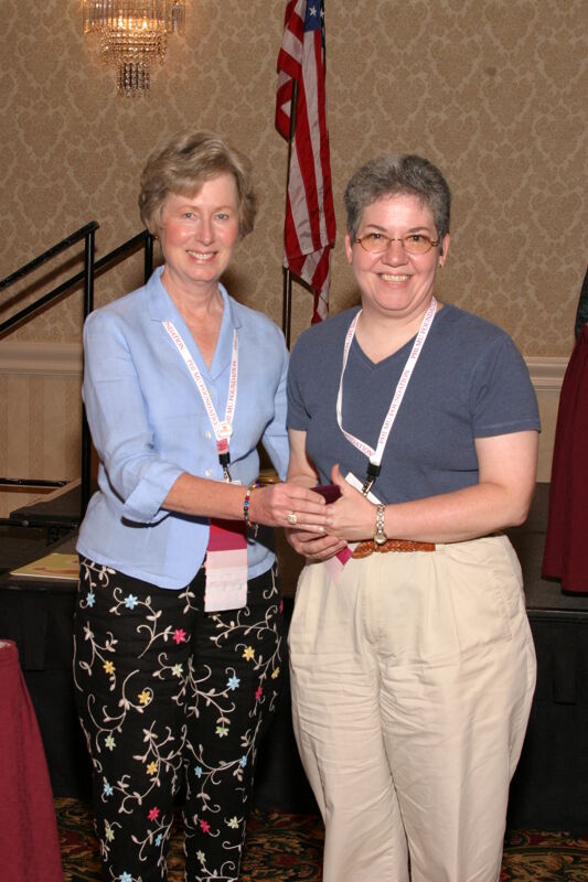 Lucy Stone and Unidentified at Convention Foundation Awards Presentation Photograph 8, July 9, 2004 (Image)
