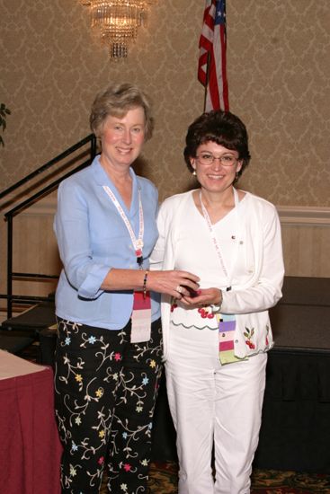 Lucy Stone and Unidentified at Convention Foundation Awards Presentation Photograph 7, July 9, 2004 (image)