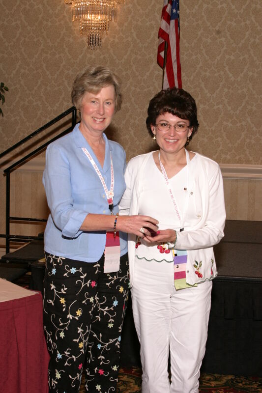 Lucy Stone and Unidentified at Convention Foundation Awards Presentation Photograph 7, July 9, 2004 (Image)