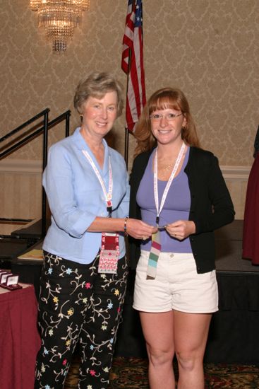 Lucy Stone and Unidentified at Convention Foundation Awards Presentation Photograph 5, July 9, 2004 (image)