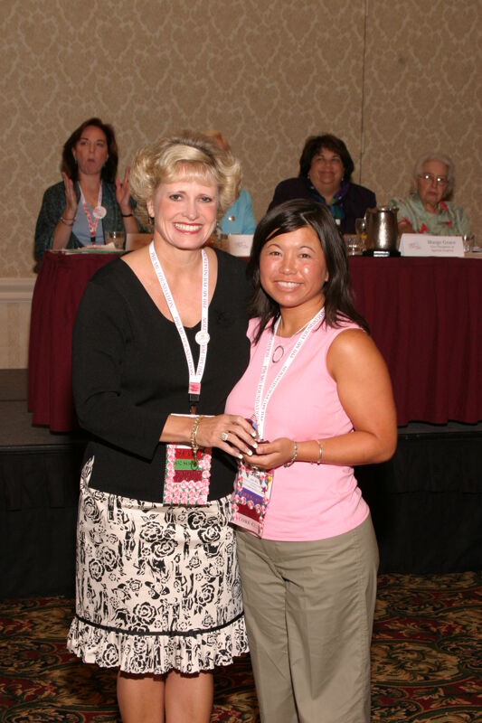 Kathie Garland and Jen Wu at Convention Foundation Awards Presentation Photograph, July 9, 2004 (Image)