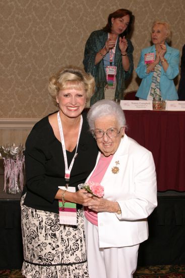 Kathie Garland and Leona Hughes at Convention Foundation Awards Presentation Photograph, July 9, 2004 (image)