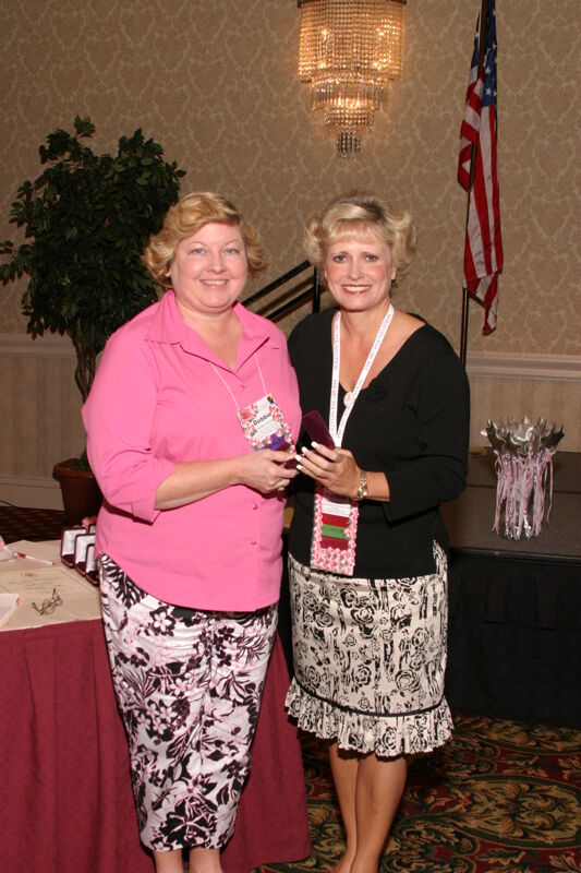 Kathie Garland and Debbie Noone at Convention Foundation Awards Presentation Photograph, July 9, 2004 (Image)
