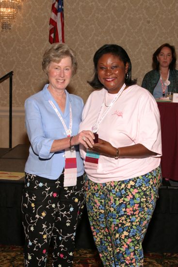 Lucy Stone and Unidentified at Convention Foundation Awards Presentation Photograph 9, July 9, 2004 (image)