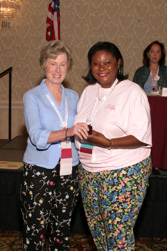 Lucy Stone and Unidentified at Convention Foundation Awards Presentation Photograph 9, July 9, 2004 (Image)