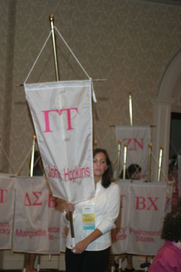 Unidentified Phi Mu With Gamma Tau Chapter Banner in Convention Parade of Flags Photograph, July 9, 2004 (image)