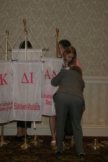 Phi Mus Picking Up Chapter Banners at Convention Photograph, July 9, 2004 (image)