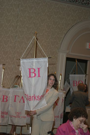 Unidentified Phi Mu With Beta Iota Chapter Banner in Convention Parade of Flags Photograph, July 9, 2004 (image)