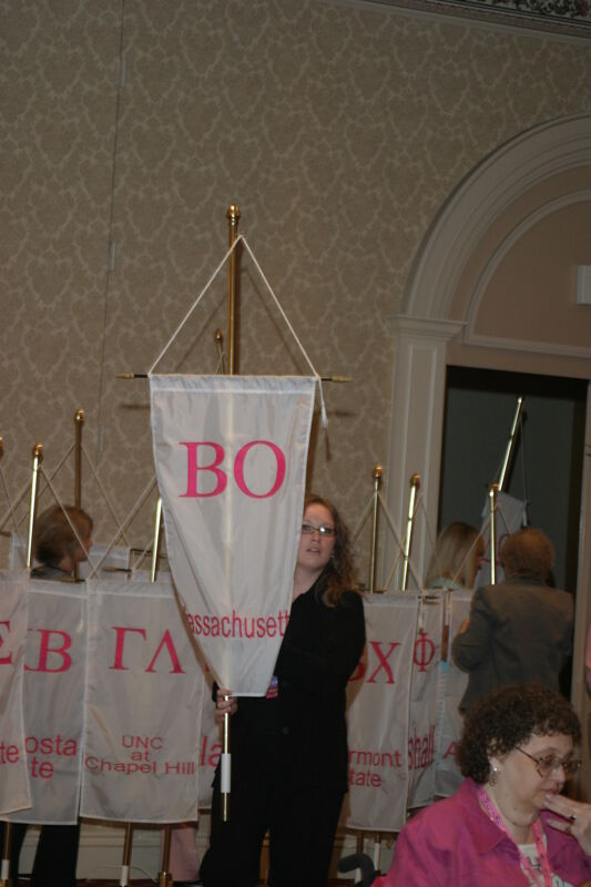Unidentified Phi Mu With Beta Omicron Chapter Banner in Convention Parade of Flags Photograph, July 9, 2004 (Image)